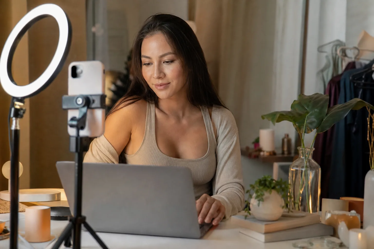 Creator planning posts at her desk with a ring light